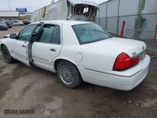 2001 Mercury Grand Marquis GS with VIN 2MEFM74W81X612809, listed as a IAAI auction lot 41697200 with 160,423 mi miles. Bid and sale history available at carsss.com. Image 3.