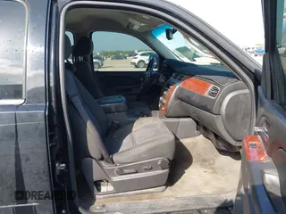 2011 Chevrolet Tahoe LS with VIN 1GNSCAE05BR380084, listed as a IAAI auction lot 42746873 with 386,755 mi miles and . Bid and sale history available at DreamBid. Image 5.