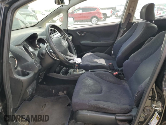 2012 Honda Fit Sport with VIN JHMGE8H5XCC006016, listed as a Copart auction lot 52941995 with 196,312 mi miles and Salvage Title. Bid and sale history available at carsss.com. Image 7.