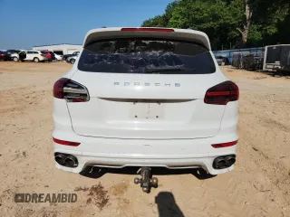 2015 Porsche Cayenne S with VIN WP1AB2A24FLA59813, listed as a Copart auction lot 60604305 with 137,719 mi miles and Salvage title. Bid and sale history available at DreamBid. Image 6.