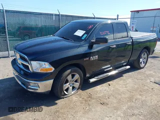2009 Dodge 1500 Laramie with VIN 1D3HB18T19S722569, listed as a IAAI auction lot 42122772 with 118,557 mi miles and . Bid and sale history available at DreamBid. Image 2.