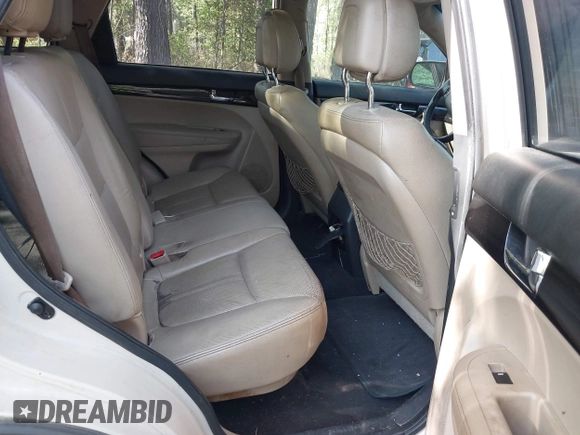 2011 Kia Sorento EX with VIN 5XYKU4A27BG011773, listed as a IAAI auction lot 42085204 with 292,692 mi miles. Bid and sale history available at carsss.com. Image 8.