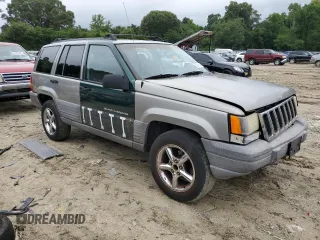 1998 Jeep Grand Cherokee Laredo with VIN 1J4FX58S7WC350624, listed as a Copart auction lot 63063624 with 0 mi miles and Salvage Title. Bid and sale history available at carsss.com. Image 4.