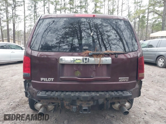 2010 Honda Pilot Touring with VIN 5FNYF4H9XAB040715, listed as a IAAI auction lot 41807334 with 262,786 mi miles and . Bid and sale history available at carsss.com. Image 17.