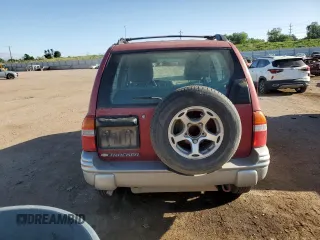 2001 Chevrolet Tracker LT z VIN 2CNBJ634716945832, wystawiony jako Copart lot #61967345 z przebiegiem 136 403 mil mil oraz Szkoda całkowita • Salvage title. Historia ofert i sprzedaży dostępna na DreamBid. Obrazek 6.