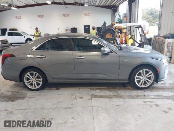 2021 Cadillac CT4 Luxury with VIN 1G6DA5RK4M0147723, listed as a IAAI auction lot 41646082 with 14,459 mi miles and . Bid and sale history available at DreamBid. Image 13.