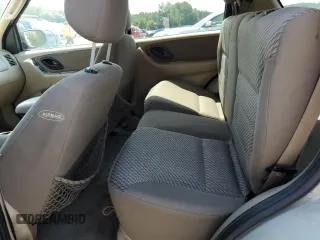 2004 Ford Escape XLT with VIN 1FMCU03134KB53192, listed as a Copart auction lot 62178075 with 223,637 mi miles and Salvage title. Bid and sale history available at DreamBid. Image 11.