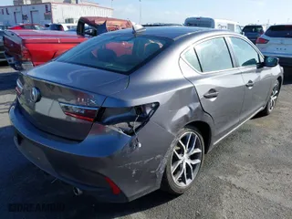 2019 Acura ILX w/Premium Pkg with VIN 19UDE2F74KA009785, listed as a IAAI auction lot 41712067 with 27,575 mi miles. Bid and sale history available at carsss.com. Image 4.
