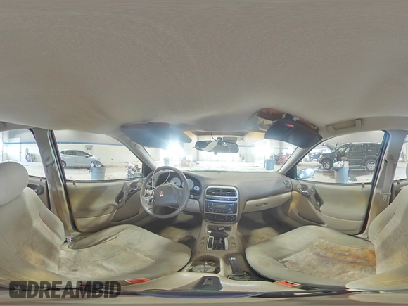 2004 Saturn L L300 2 z VIN 1G8JD54RX4Y520917, wystawiony jako Copart lot #88127805 z przebiegiem 70 549 mil mil oraz Szkoda całkowita • Salvage title. Historia ofert i sprzedaży dostępna na DreamBid. Obrazek 13.