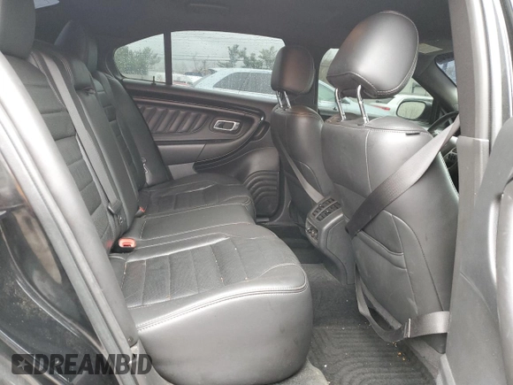 2015 Ford Taurus SHO z VIN 1FAHP2KT2FG182307, wystawiony jako Copart lot #52596525 z przebiegiem 68 214 mil mil oraz Szkoda całkowita • Salvage title. Historia ofert i sprzedaży dostępna na DreamBid. Obrazek 10.
