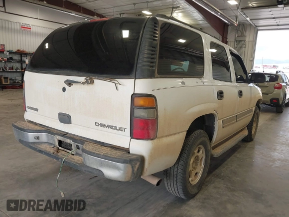 2005 Chevrolet Tahoe LS with VIN 1GNEC13V75J186607, listed as a IAAI auction lot 42090566 with 244,715 mi miles. Bid and sale history available at carsss.com. Image 4.