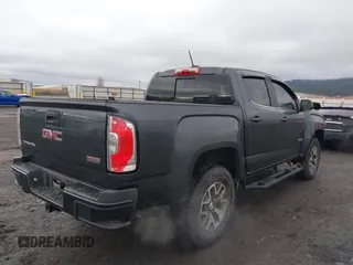 2016 GMC Canyon 4WD SLE with VIN 1GTG6CE37G1282630, listed as a IAAI auction lot 41153472 with 57,809 mi miles. Bid and sale history available at carsss.com. Image 4.