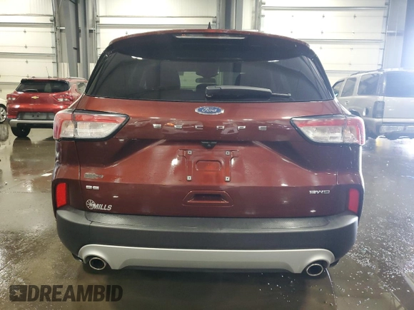 2021 Ford Escape SE with VIN 1FMCU9G60MUA90728, listed as a Copart auction lot 60124145 with 42,744 mi miles and Salvage title. Bid and sale history available at DreamBid. Image 6.