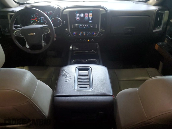 2017 Chevrolet Silverado 1500 LTZ with VIN 3GCPCSEC9HG339738, listed as a Copart auction lot 53599595 with 220,488 mi miles and Salvage Title. Bid and sale history available at DreamBid. Image 8.