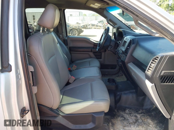 2018 Ford F-150 XL with VIN 1FTFX1EG1JKD86371, listed as a IAAI auction lot 42617305 with 212,187 mi miles and . Bid and sale history available at DreamBid. Image 5.