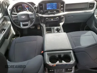2023 Ford F-150 XL with VIN 1FTFW1E85PKG17275, listed as a Copart auction lot 57497155 with 34,379 mi miles and Salvage title. Bid and sale history available at DreamBid. Image 8.