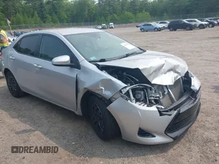 2018 Toyota Corolla L with VIN 2T1BURHE5JC105822, listed as a IAAI auction lot 42421968 with 71,505 mi miles and . Bid and sale history available at DreamBid. Image 1.