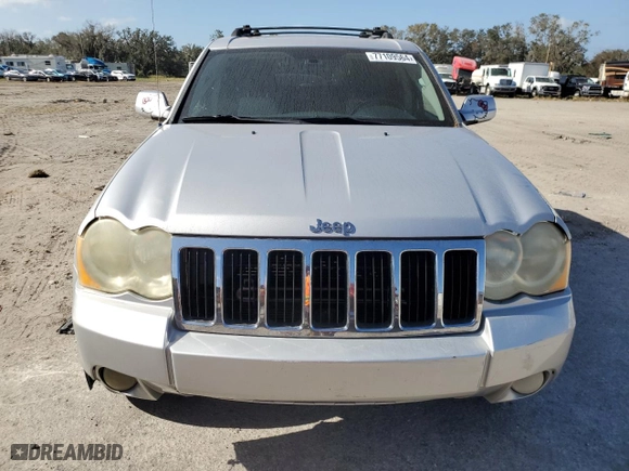 2009 Jeep Grand Cherokee Limited with VIN 1J8HS58P69C521028, listed as a Copart auction lot 77109564 with 147,700 mi miles and Clean Title. Bid and sale history available at carsss.com. Image 5.