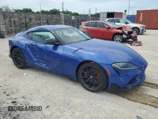 2023 Toyota Supra 3.0 with VIN WZ1DB0G08PW061526, listed as a Copart auction lot 61642655 with 11,279 mi miles and Salvage title. Bid and sale history available at DreamBid. Image 4.