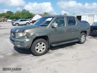 2007 Honda Ridgeline RTL w/Leather with VIN 2HJYK16527H547522, listed as a IAAI auction lot 41939603 with 127,899 mi miles. Bid and sale history available at carsss.com. Image 17.