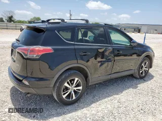 2018 Toyota RAV4 XLE with VIN 2T3WFREV7JW429716, listed as a Copart auction lot 64309045 with 156,445 mi miles and Salvage title. Bid and sale history available at DreamBid. Image 3.