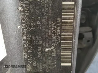 2016 Kia Optima LX z VIN KNAGT4L30G5107370, wystawiony jako Copart lot #50686815 z przebiegiem 156 297 mil mil oraz Szkoda całkowita • Salvage title. Historia ofert i sprzedaży dostępna na DreamBid. Obrazek 12.