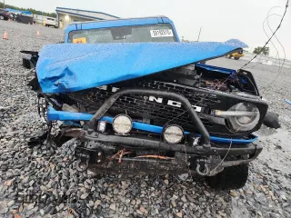 2021 Ford Bronco z VIN 1FMEE5DPXMLB01431, wystawiony jako Copart lot #59192915 z przebiegiem Nie podano mil oraz Nie do naprawy • Non repairable. Historia ofert i sprzedaży dostępna na DreamBid. Obrazek 5.