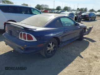 1996 Ford Mustang with VIN 1FALP4044TF223135, listed as a IAAI auction lot 41390359 with 199,143 mi miles. Bid and sale history available at carsss.com. Image 4.