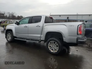 2015 GMC Canyon 4WD SLT with VIN 1GTG6CE35F1251486, listed as a Copart auction lot 46884015 with 162,144 mi miles and Salvage Title. Bid and sale history available at carsss.com. Image 2.