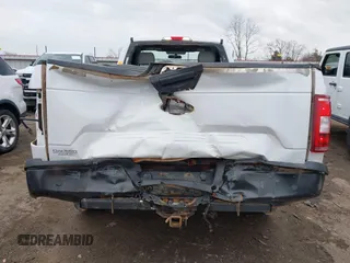 2018 Ford F-150 XL with VIN 1FTNF1E53JKC23766, listed as a IAAI auction lot 41149145 with 301,176 mi miles and . Bid and sale history available at DreamBid. Image 17.