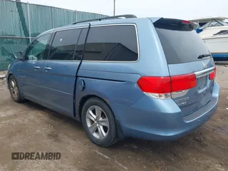 2010 Honda Odyssey Touring with VIN 5FNRL3H93AB008129, listed as a IAAI auction lot 42115112 with 260,075 mi miles. Bid and sale history available at carsss.com. Image 3.