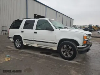 1997 Chevrolet Tahoe with VIN 1GNEK13R2VJ339111, listed as a Copart auction lot 48187215 with 166,260 mi miles and Salvage Title. Bid and sale history available at carsss.com. Image 4.