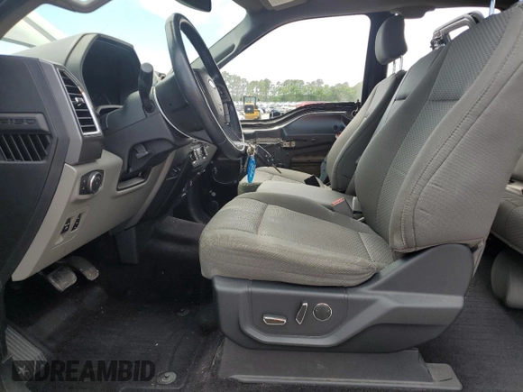 2015 Ford F-150 XLT with VIN 1FTEX1EP6FFC26434, listed as a Copart auction lot 57378705 with 129,295 mi miles and Salvage title. Bid and sale history available at DreamBid. Image 7.