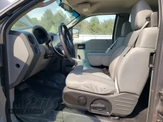 2007 Ford F-150 STX with VIN 1FTRX12W37FB04662, listed as a Copart auction lot 54192815 with 123,863 mi miles and Salvage title. Bid and sale history available at DreamBid. Image 7.