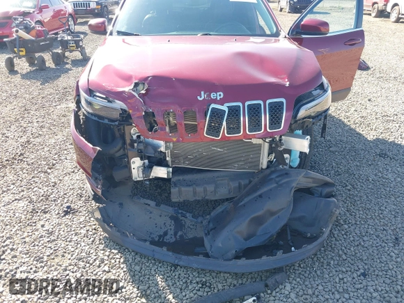 2019 Jeep Cherokee Altitude with VIN 1C4PJMLXXKD223718, listed as a IAAI auction lot 42043756 with 62,073 mi miles and . Bid and sale history available at DreamBid. Image 6.