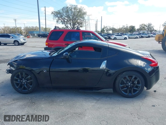 2017 Nissan 370Z with VIN JN1AZ4EH5HM954458, listed as a IAAI auction lot 41629907 with 113,606 mi miles. Bid and sale history available at carsss.com. Image 13.