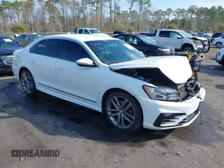 2016 Volkswagen Passat 1.8T S with VIN 1VWAT7A31GC048223, listed as a IAAI auction lot 41523658 with 151,618 mi miles. Bid and sale history available at carsss.com. Image 1.
