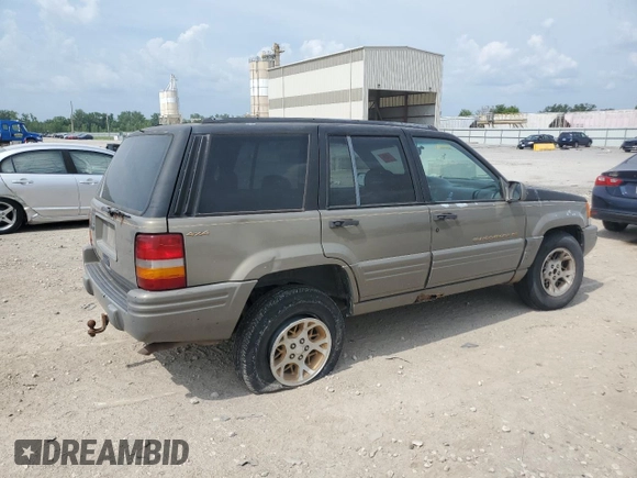 1996 Jeep Grand Cherokee Limited with VIN 1J4GZ78S3TC395758, listed as a Copart auction lot 60326205 with Not provided miles and Salvage title. Bid and sale history available at DreamBid. Image 3.