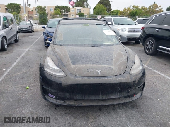 2019 Tesla Model 3 Mid Range with VIN 5YJ3E1EA2KF362048, listed as a IAAI auction lot 40141734 with 70,321 mi miles and . Bid and sale history available at carsss.com. Image 11.