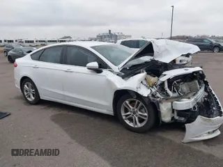 2018 Ford Fusion SE z VIN 3FA6P0H73JR212616, wystawiony jako IAAI lot #40869945 z przebiegiem 142 355 mil mil oraz . Historia ofert i sprzedaży dostępna na DreamBid. Obrazek 1.