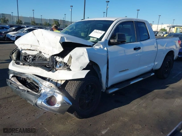 2013 Toyota Tundra 4WD Truck with VIN 5TFUW5F1XDX305466, listed as a IAAI auction lot 41862141 with 133,433 mi miles. Bid and sale history available at carsss.com. Image 2.