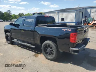 2016 Chevrolet Silverado 1500 LT with VIN 3GCUKREC4GG110641, listed as a Copart auction lot 52310425 with 156,968 mi miles and Salvage Title. Bid and sale history available at DreamBid. Image 2.