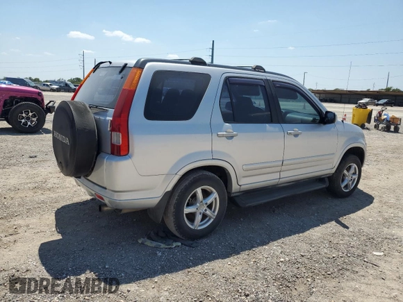 2002 Honda CR-V LX with VIN JHLRD68512C025394, listed as a Copart auction lot 67161964 with 143,660 mi miles and Salvage Title. Bid and sale history available at DreamBid. Image 3.
