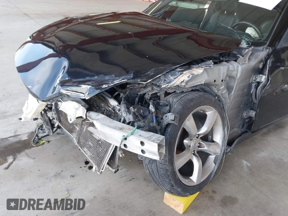 2008 Nissan 350Z z VIN JN1BZ34D98M705867, wystawiony jako IAAI lot #41871586 z przebiegiem 90 717 mil mil oraz . Historia ofert i sprzedaży dostępna na DreamBid. Obrazek 6.