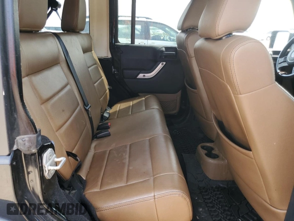 2011 Jeep Wrangler Unlimited Rubicon with VIN 1J4BA6H16BL561658, listed as a Copart auction lot 58379755 with 103,587 mi miles and Salvage title. Bid and sale history available at DreamBid. Image 10.