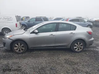2010 Mazda Mazda3 i Touring with VIN JM1BL1SG0A1224493, listed as a IAAI auction lot 41730144 with 208,950 mi miles. Bid and sale history available at carsss.com. Image 14.