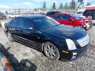 2005 Cadillac STS with VIN 1G6DW677250190268, listed as a IAAI auction lot 41702798 with 142,427 mi miles. Bid and sale history available at carsss.com. Image 13.