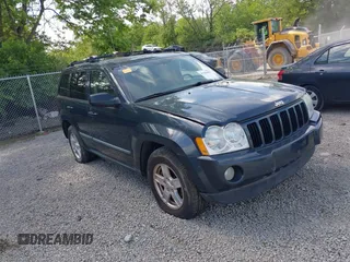 2007 Jeep Grand Cherokee Laredo z VIN 1J8HR48P57C590313, wystawiony jako IAAI lot #42306996 z przebiegiem 181 737 mil mil oraz . Historia ofert i sprzedaży dostępna na DreamBid. Obrazek 1.