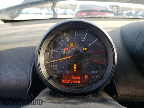 2016 MINI Countryman S with VIN WMWZC5C55GWU22112, listed as a Copart auction lot 82132654 with 60,210 mi miles and Salvage Title. Bid and sale history available at DreamBid. Image 9.