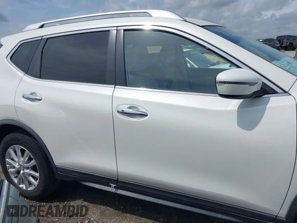 2018 Nissan Rogue SV with VIN KNMAT2MT8JP597774, listed as a IAAI auction lot 41956655 with 63,237 mi miles and . Bid and sale history available at carsss.com. Image 13.